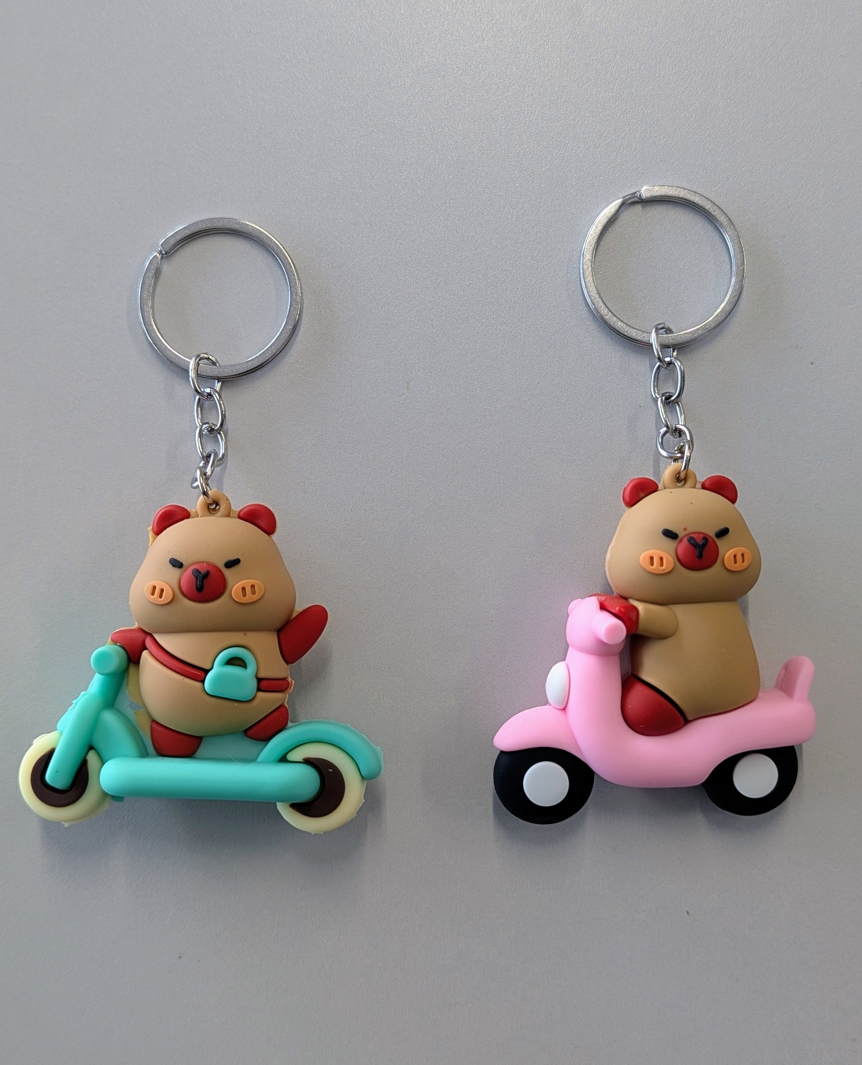 Capybara in scooter keychain