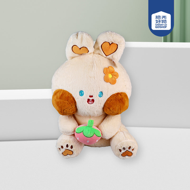 Strawberry holding cute plush toy