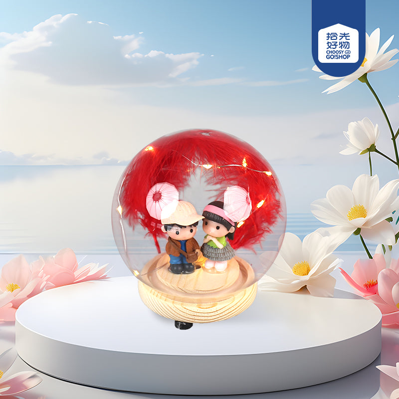 Couple lighting globe